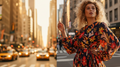 Homepage banner: model wearing Vibrant Autumn Dress, golden hour outdoor campaign shot